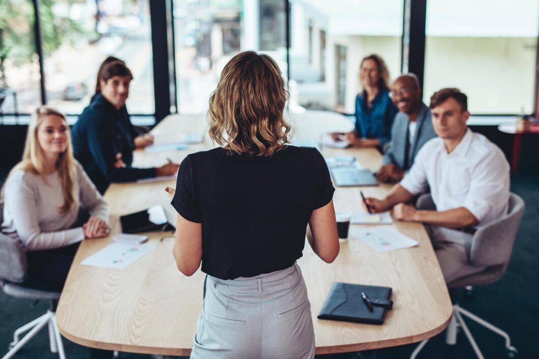 Businesswoman Addressing A Meeting In Office